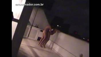 Drunks leave party discreetly, but are discovered fucking on the porch of the penthouse