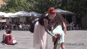 Anal plugged petite slave in public